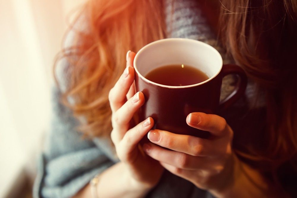 woman-drinking-hot-mug-tea