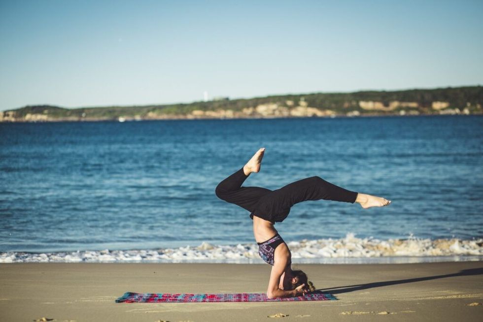 woman-doing-yoga-balancing-pose