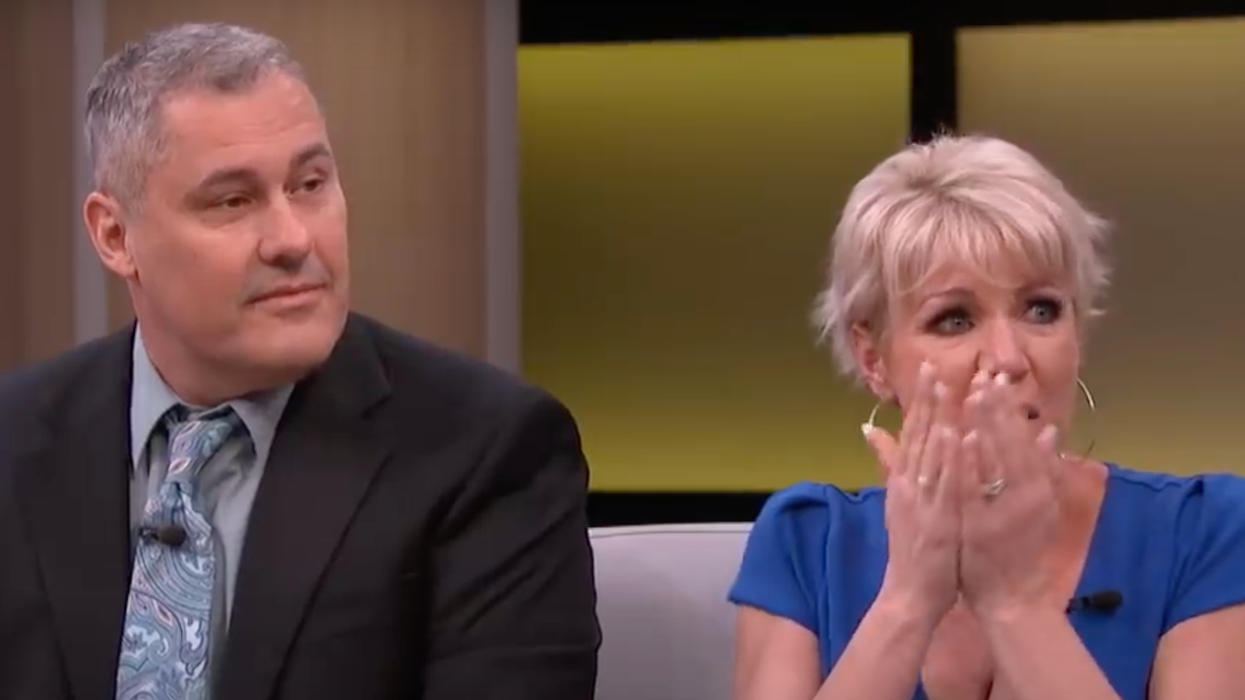 A couple looking surprised.