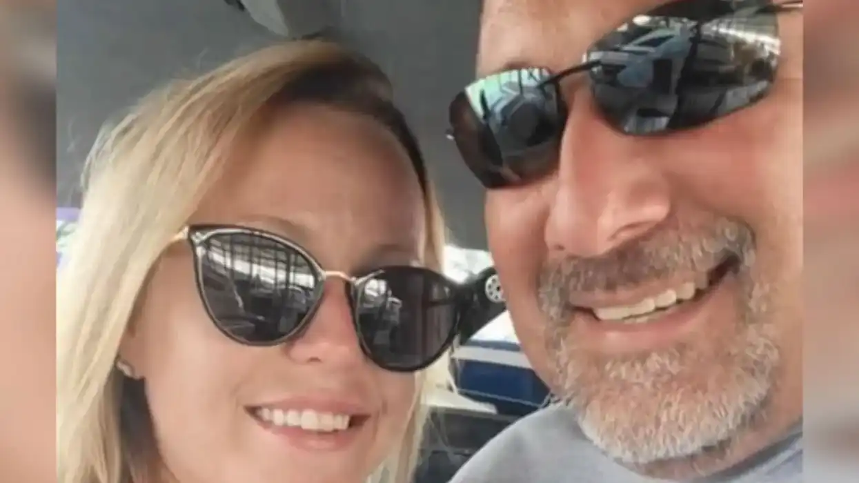 A couple wearing sunglasses.