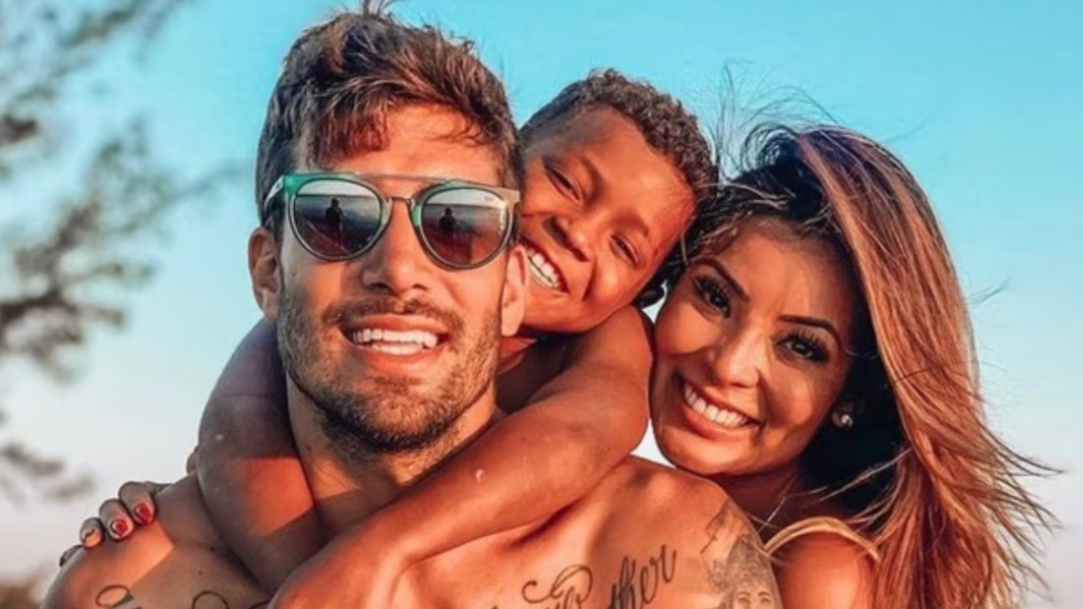 a man, a woman and a little boy