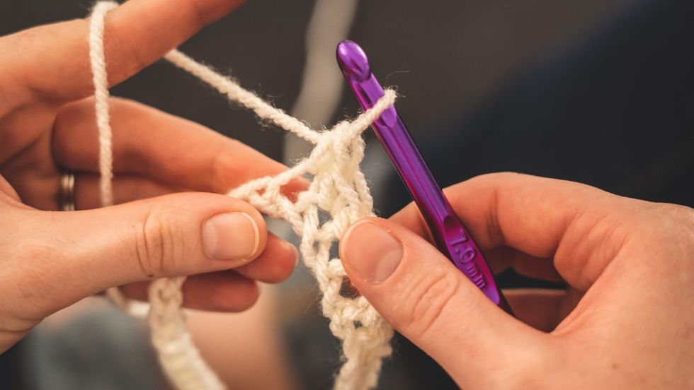 a person crocheting