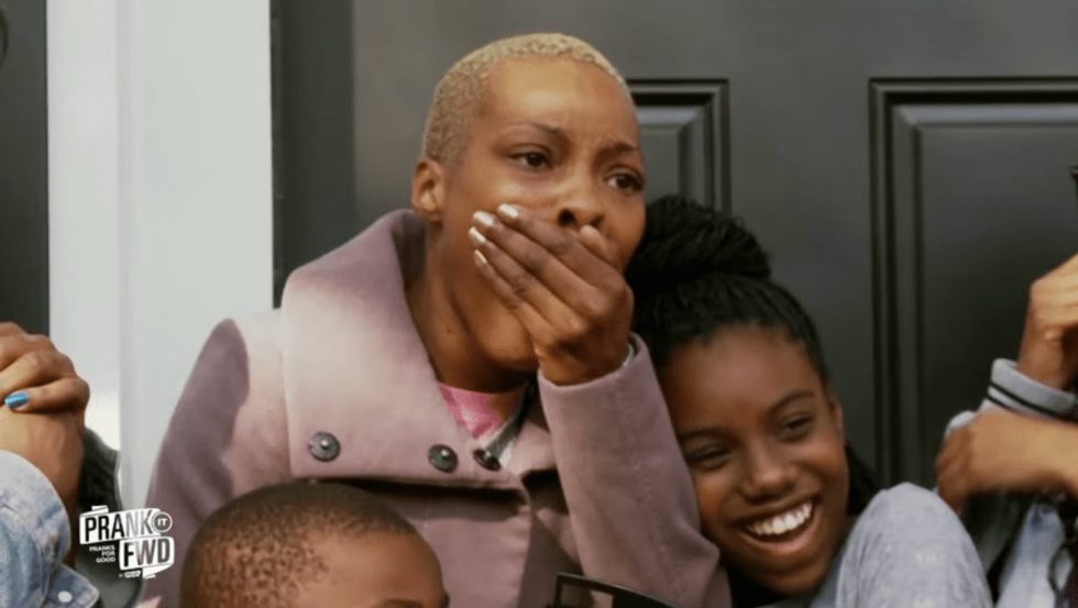 a woman looking shocked