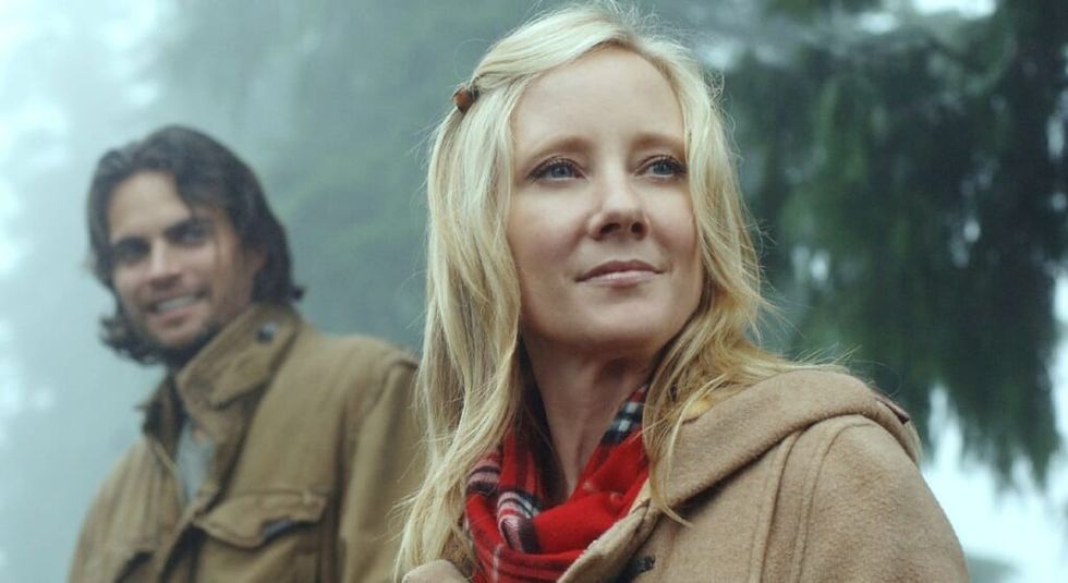 Anne Heche in Men in Trees wearing a beige jacket.
