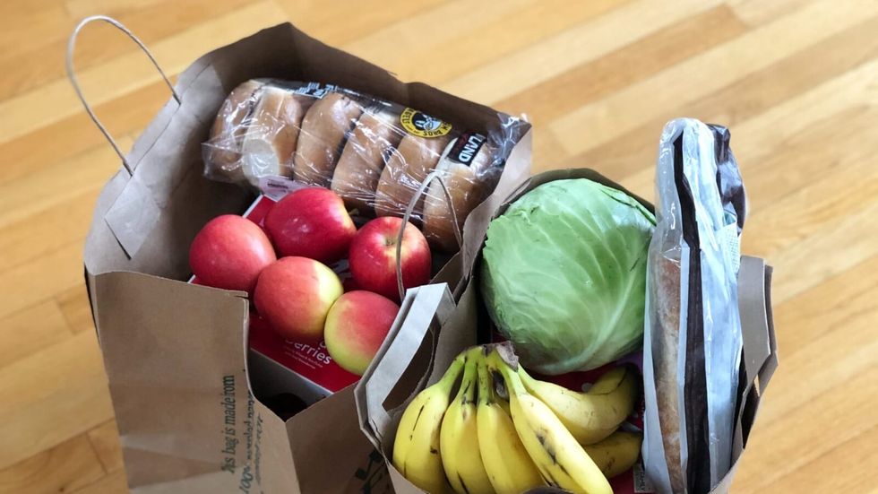 bag filled with food and fruit