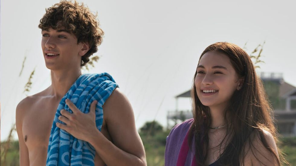 Belly and conrad with beach towels in the summer I turned pretty