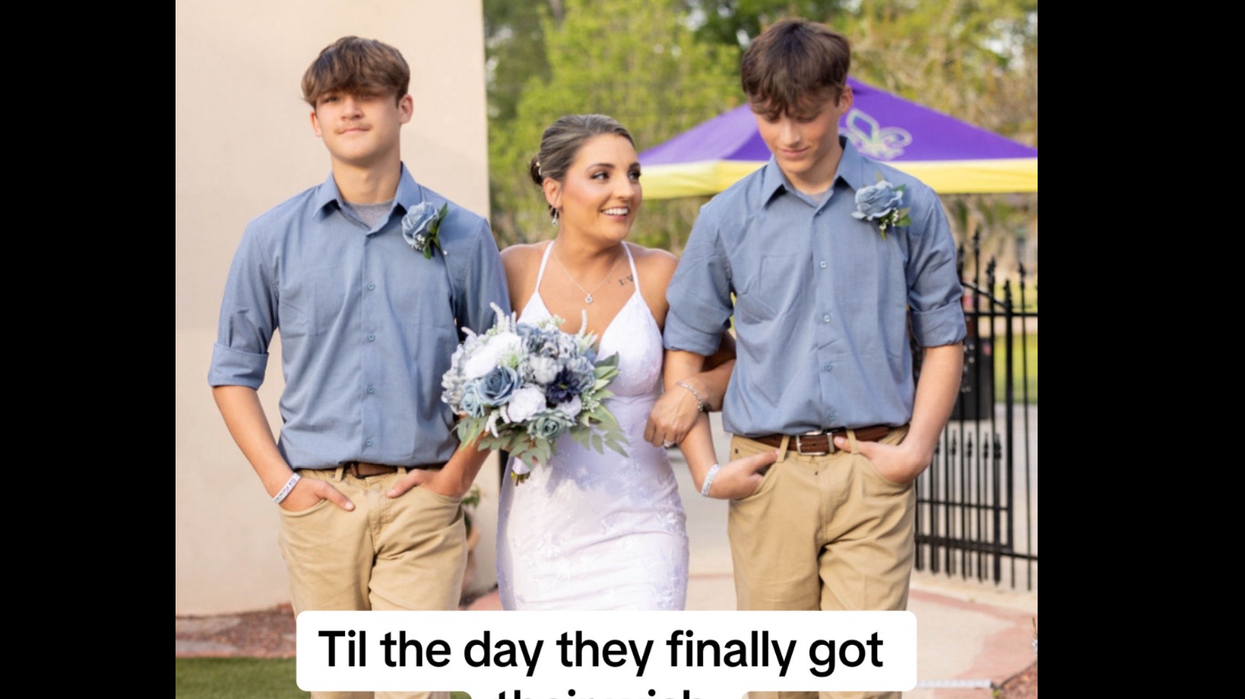 Best friends Tucker and Corbin walking Brittany down the aisle.