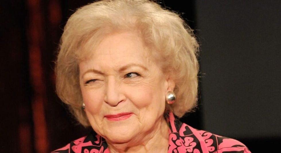 Betty White winking at the camera in an interview