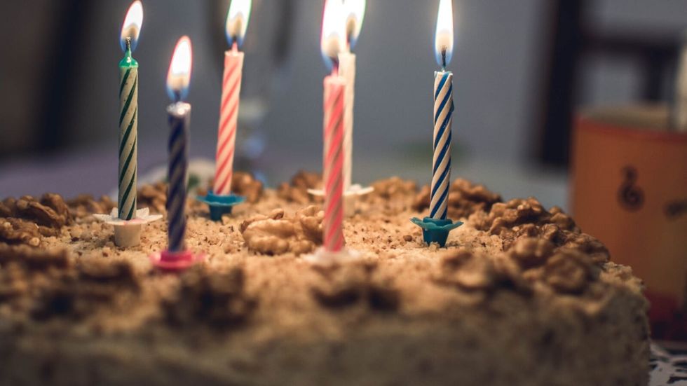 birthday cake with lit candles