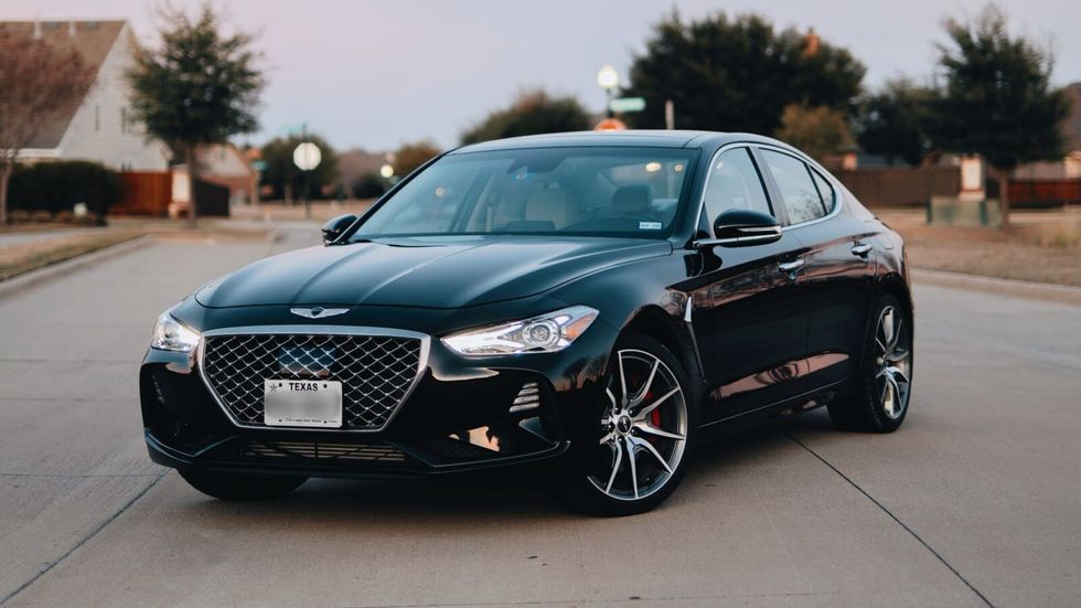 black car parked on the road