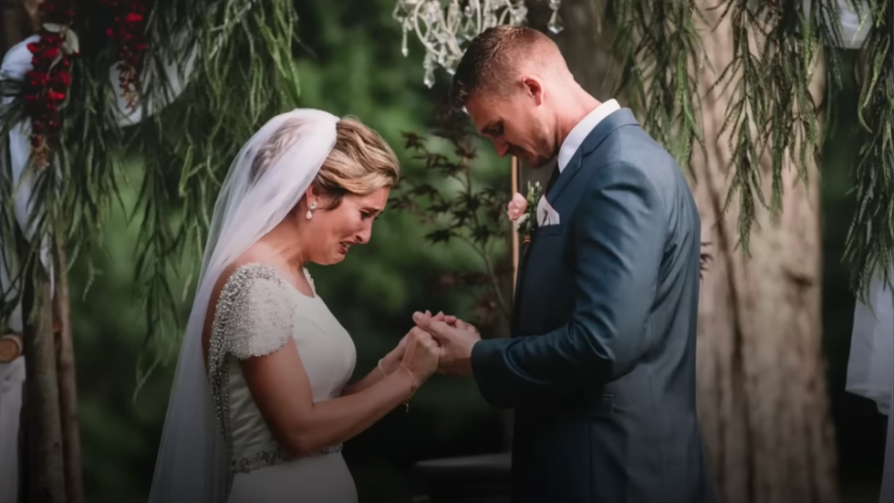 bride and groom at the altar
