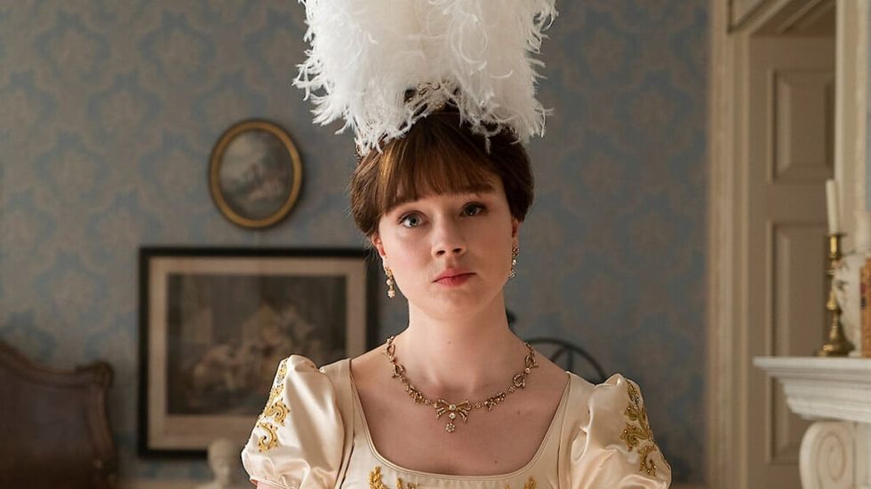 Bridgerton Eloise in a fancy feather hat