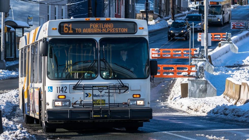 bus traveling in the snow