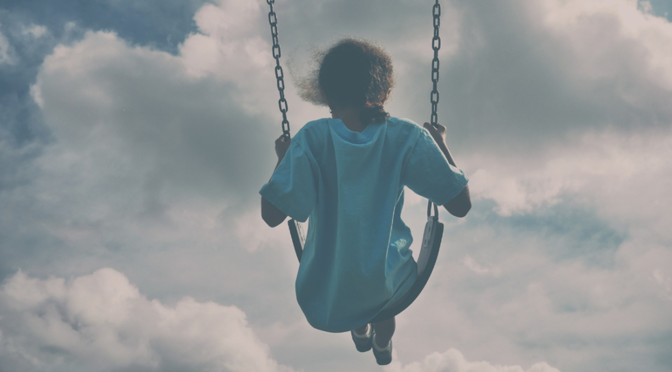 child on swing