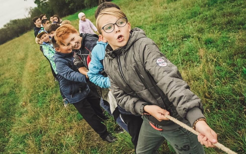 children have a tug of war