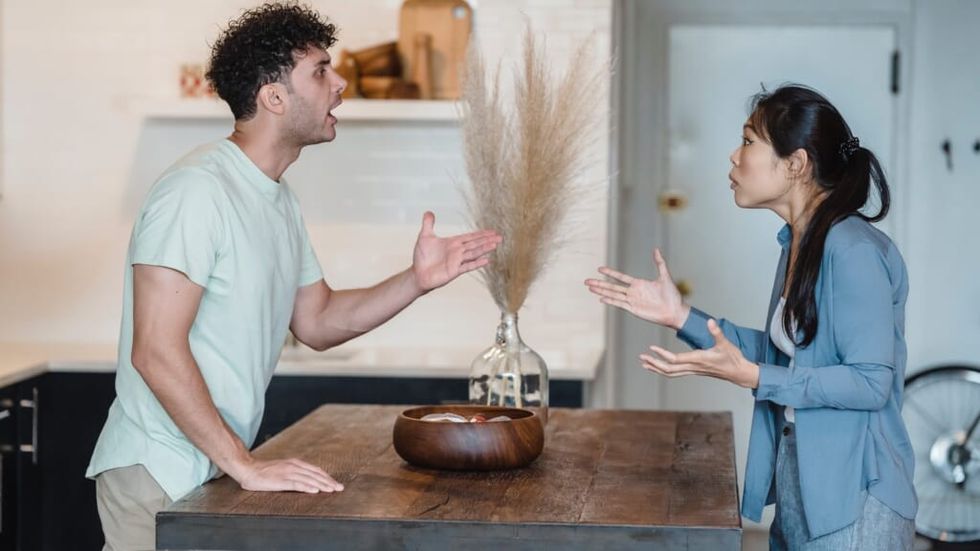 couple arguing in a house