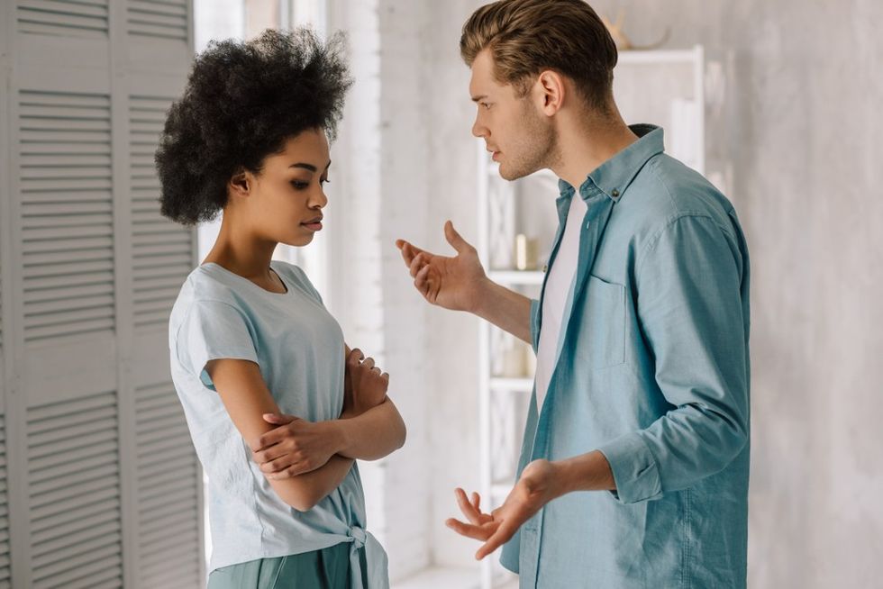 couple-arguing-trying-diffuse-tension