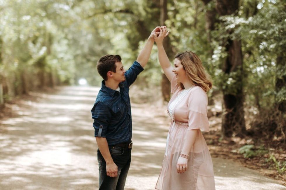 Couple-dancing-in-the-forest