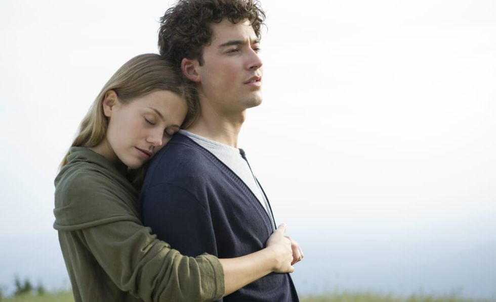 Couple embracing outdoors