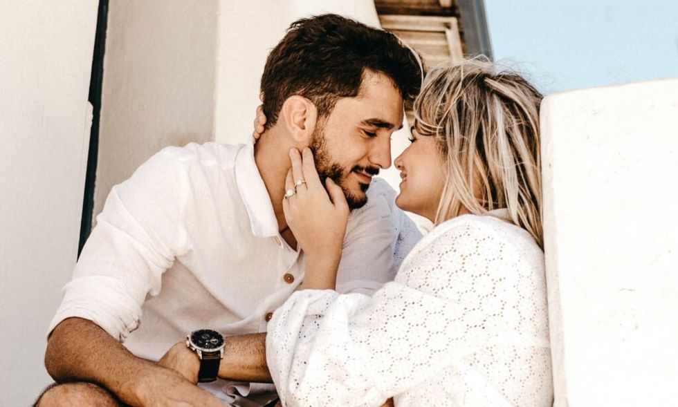 couple longingly look at each other