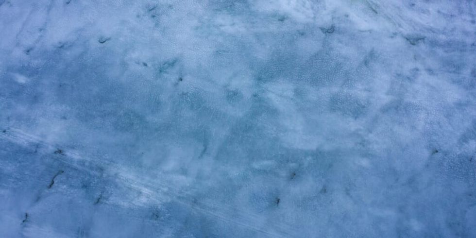 Drone image of frozen lake by Peter van der Meulen on Unsplash