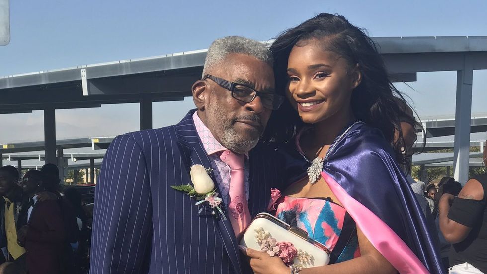 elderly man with his granddaughter