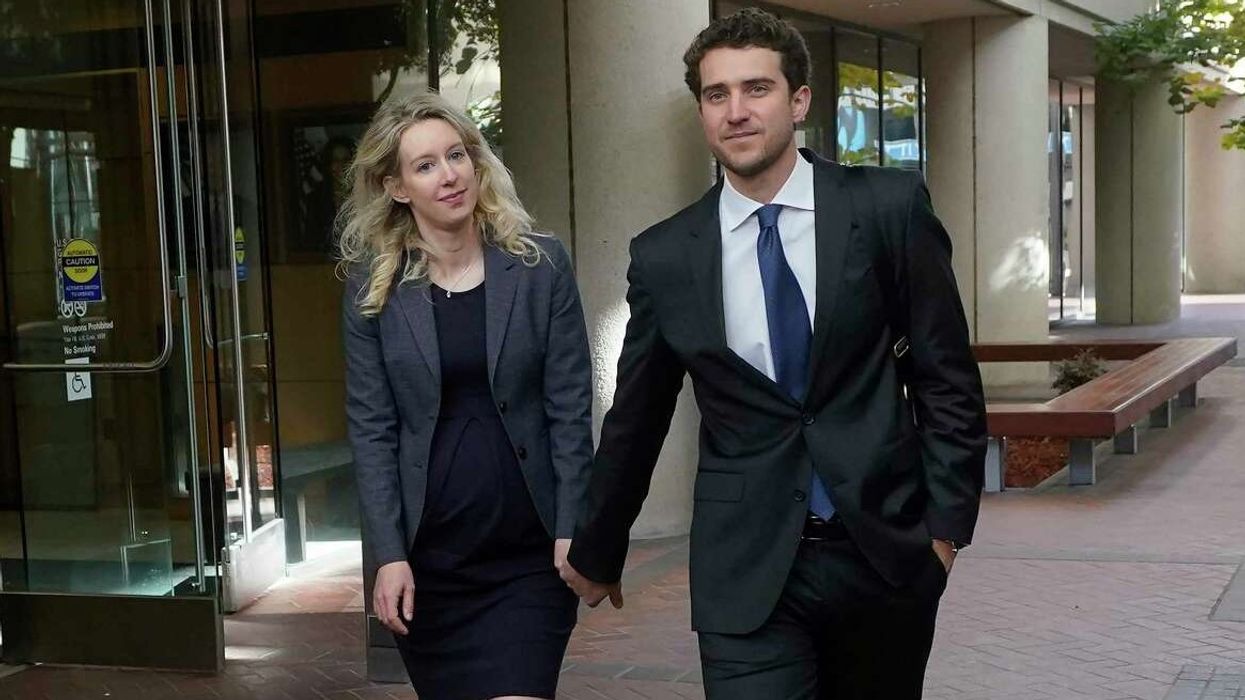 Elizabeth Holmes Faces 20 Years in Prison, Her Husband Stands by Her - Who Is Billy Evans?