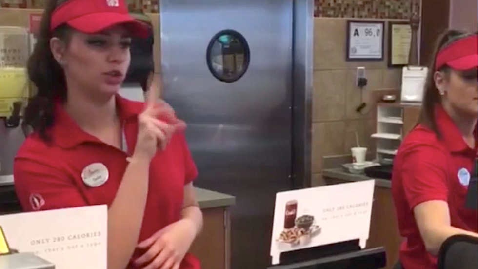 fast food restaurant employee using sign language with a customer