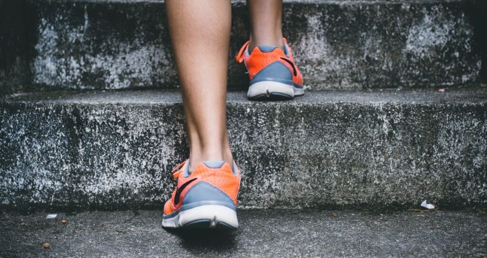 feet on concrete steps