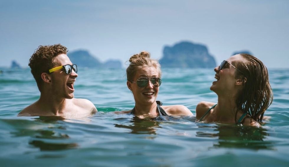 friends enjoy the water on vacation