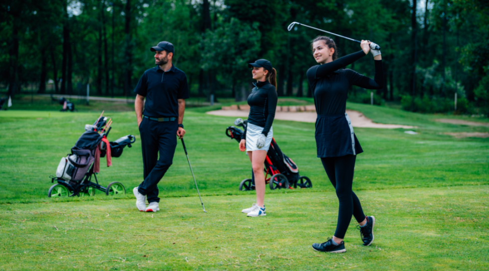 friends playing golf
