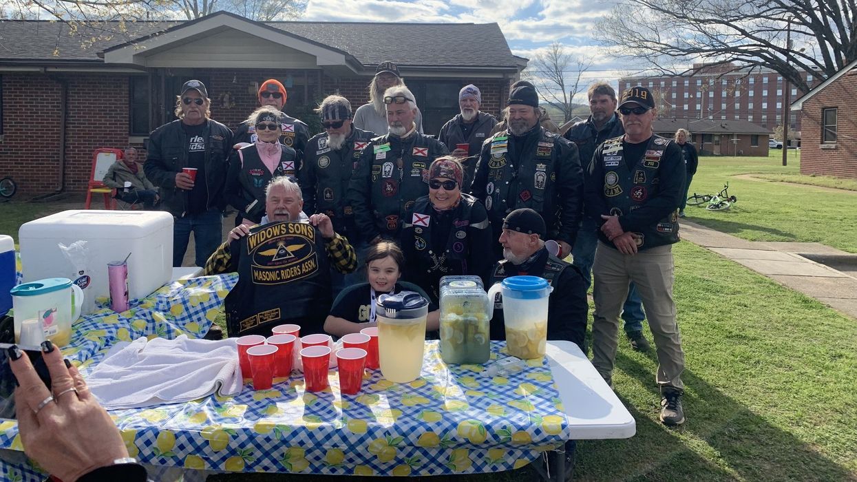 Group of people at a lemonade stand