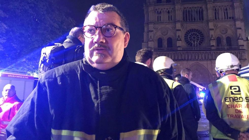 Brave Chaplain Runs Into Burning Notre-Dame to Save Priceless Relics