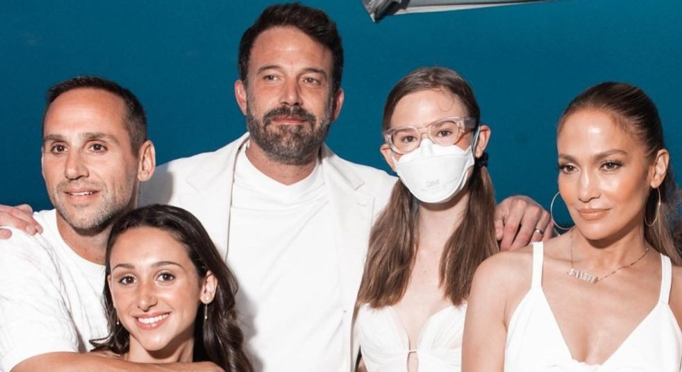 Jennifer Lopez, Ben Affleck, and Violet Affleck dressed in white for 4th of July party.