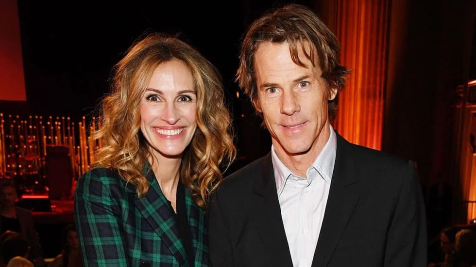 Julia Roberts in green checkered suit with husband Danny Moder