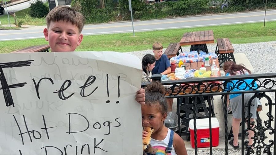 Kayden Ely gives away free hot dogs and drinks.