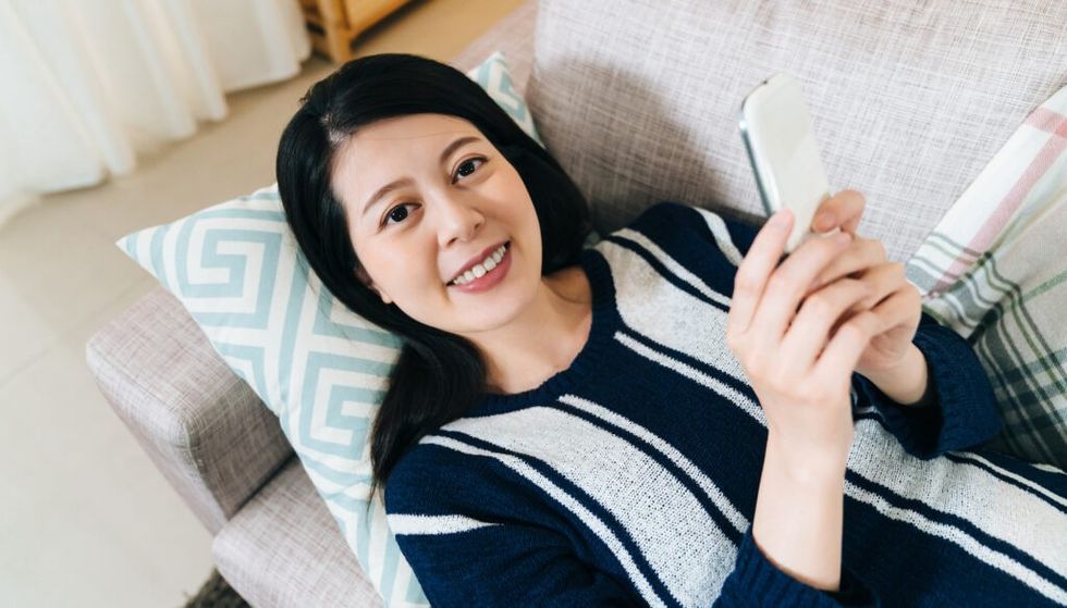 lady smiling on her phone