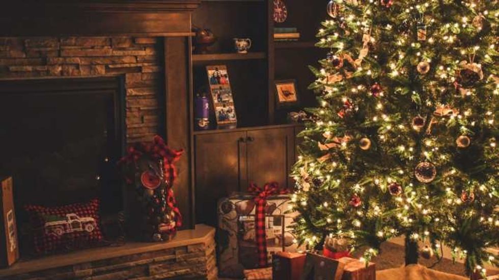 lit Christmas tree in a living room