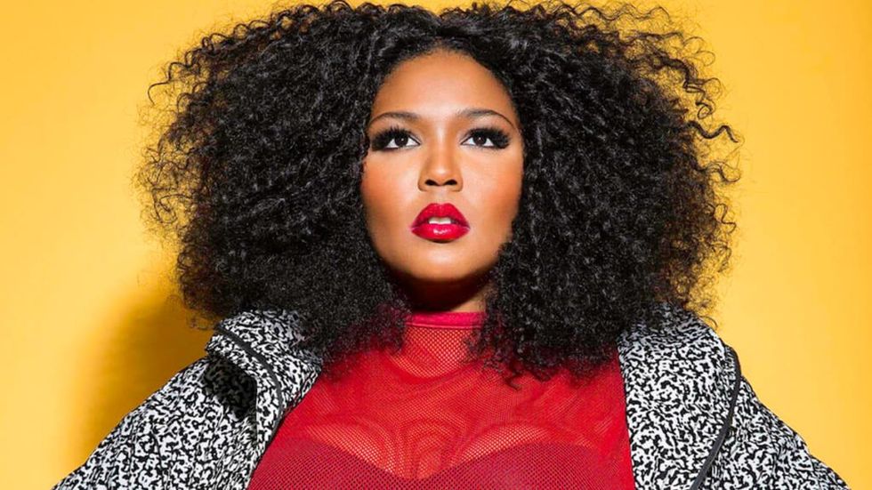 Lizzo album cover yellow background