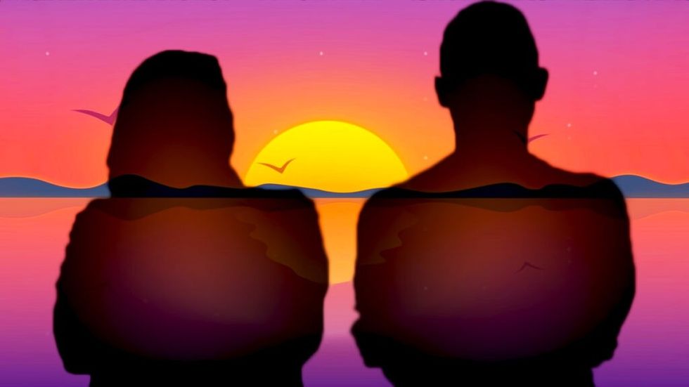 Man and woman silhouette couple stares at sunset