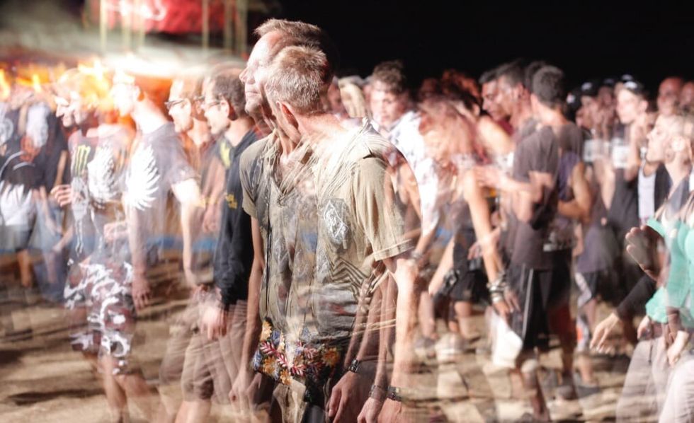 man at concert in psychedelic trip
