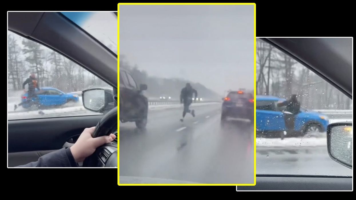 "Highway Hero": Watch This Man Dodge In and Out of Traffic to Save Unconscious Driver (VIDEO)