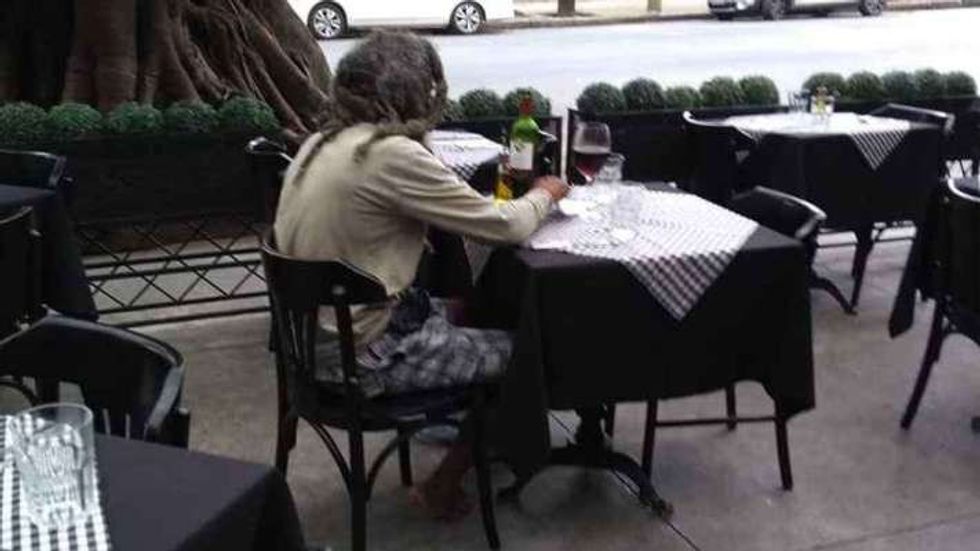 man eating alone at a restaurant