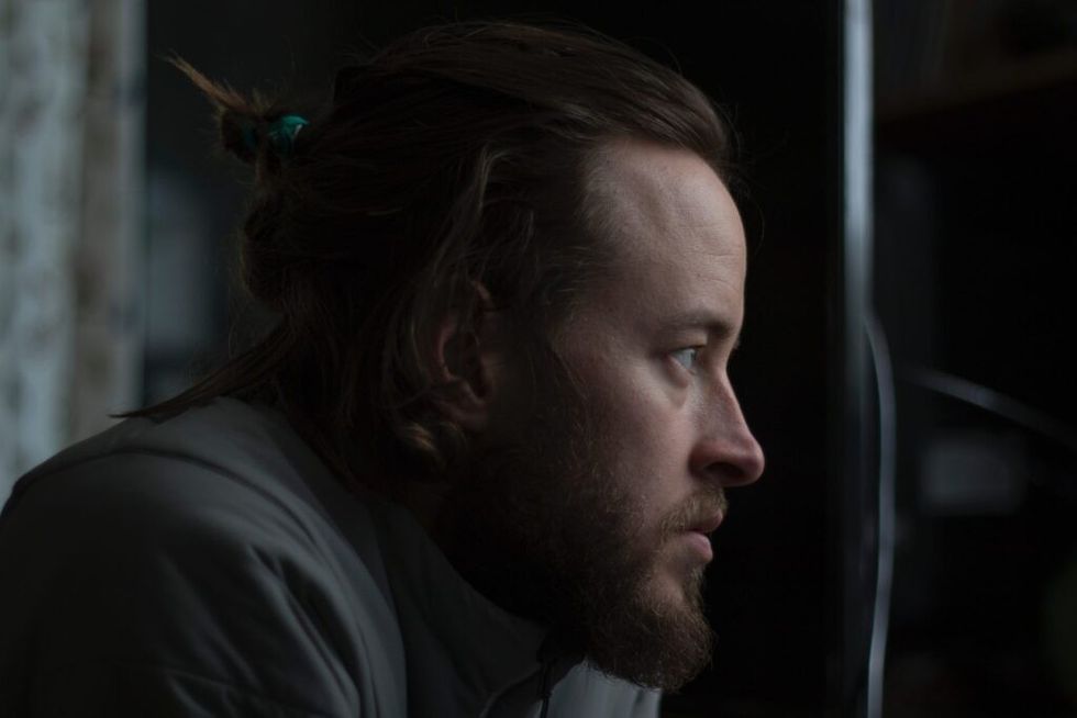 man-looking-at-something-deeply