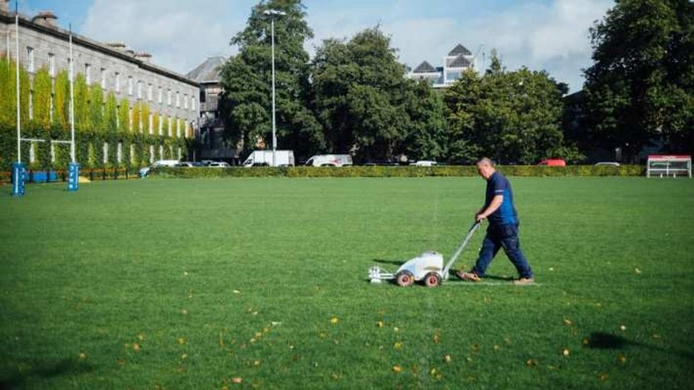 man mowing a lawn