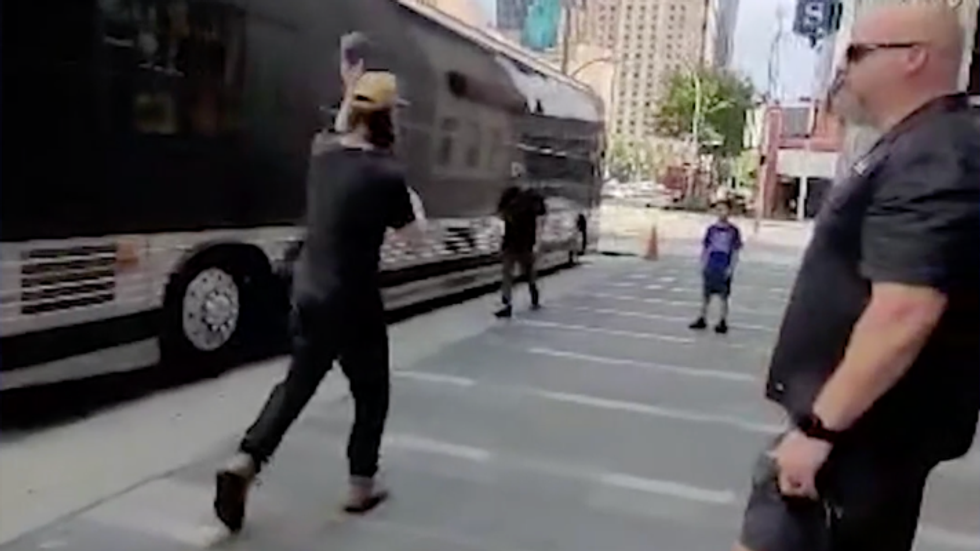 man playing catch with a young boy