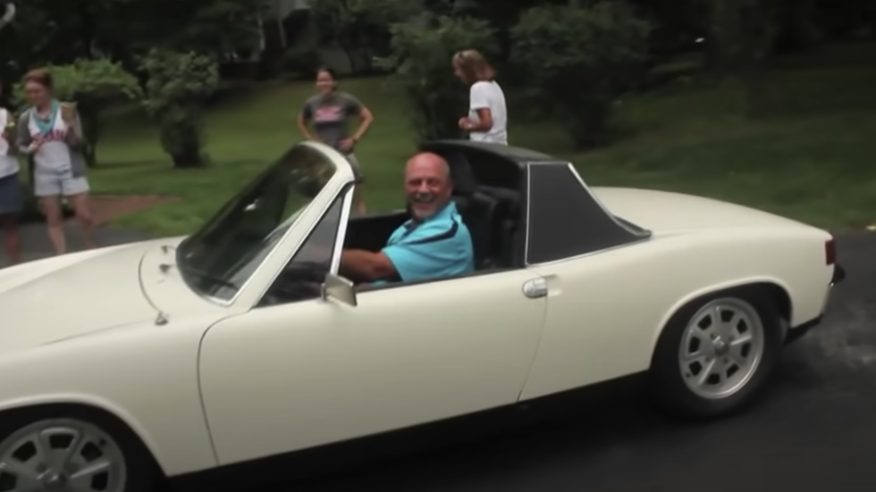 man sitting in a white car