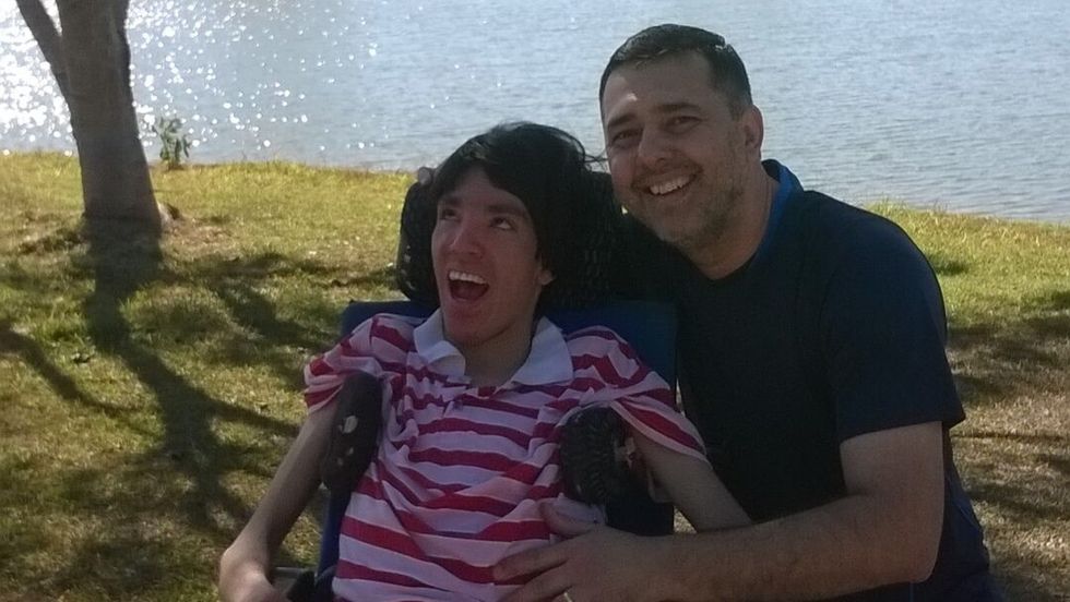 man with a smiling boy