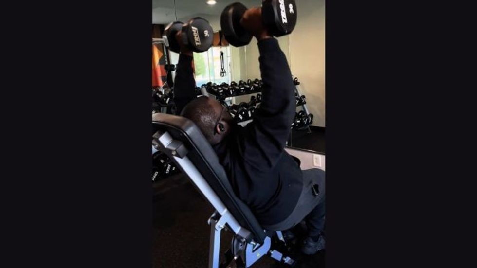 man working out at the gym
