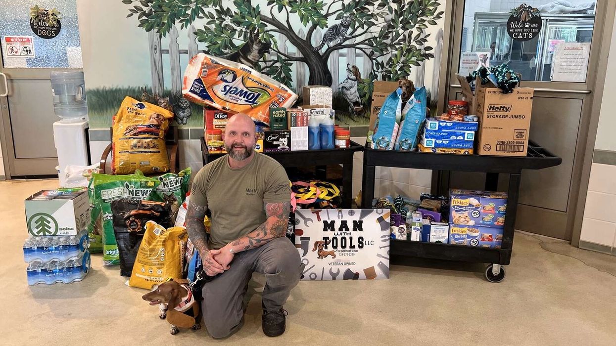 Mark Bowman of Man With Tools LLC makes a large donation to the Butler County Humane Society